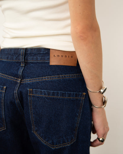 Calça Jeans Barra Cartas Bordadas